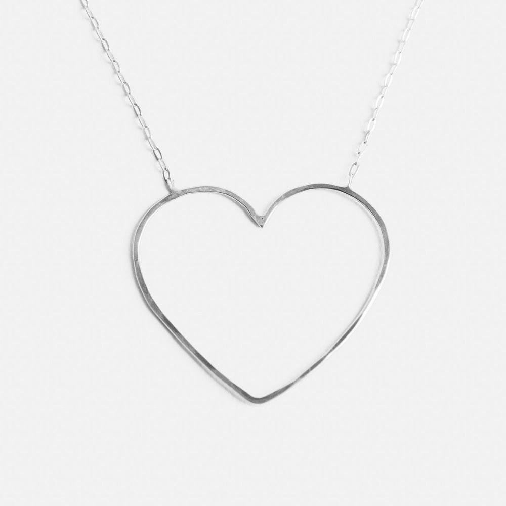 
            
                Load image into Gallery viewer, Petite Heart Necklace
            
        