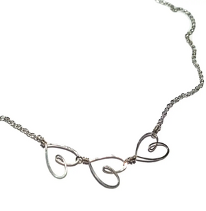 
            
                Load image into Gallery viewer, 3 Tiny Hearts Necklace - Accent&amp;#39;s Novato
            
        